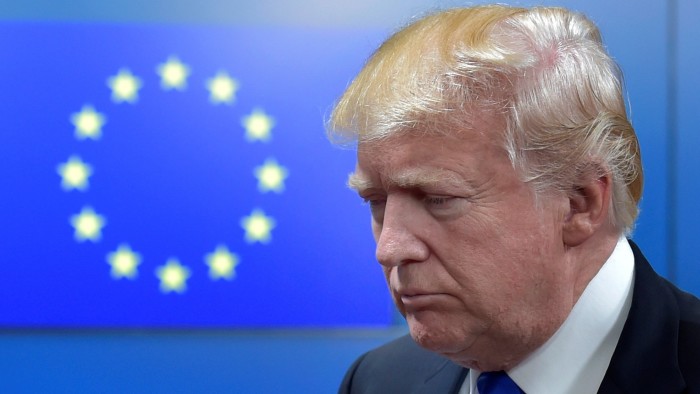 US President Donald Trump in front of an EU flag