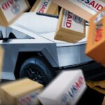 James Ferguson illustration of a Tesla truck smashing through USAID boxes