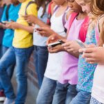 Kid's using phones during school at alarming rates as lawmakers try to clamp down