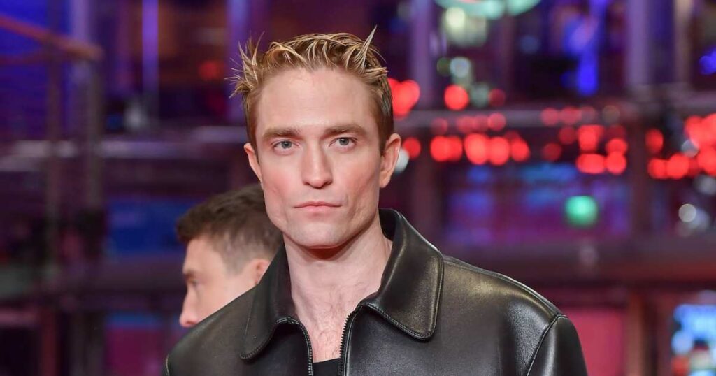 Robert Pattinson Is an 'Expert' at Changing His Daughter's Diapers