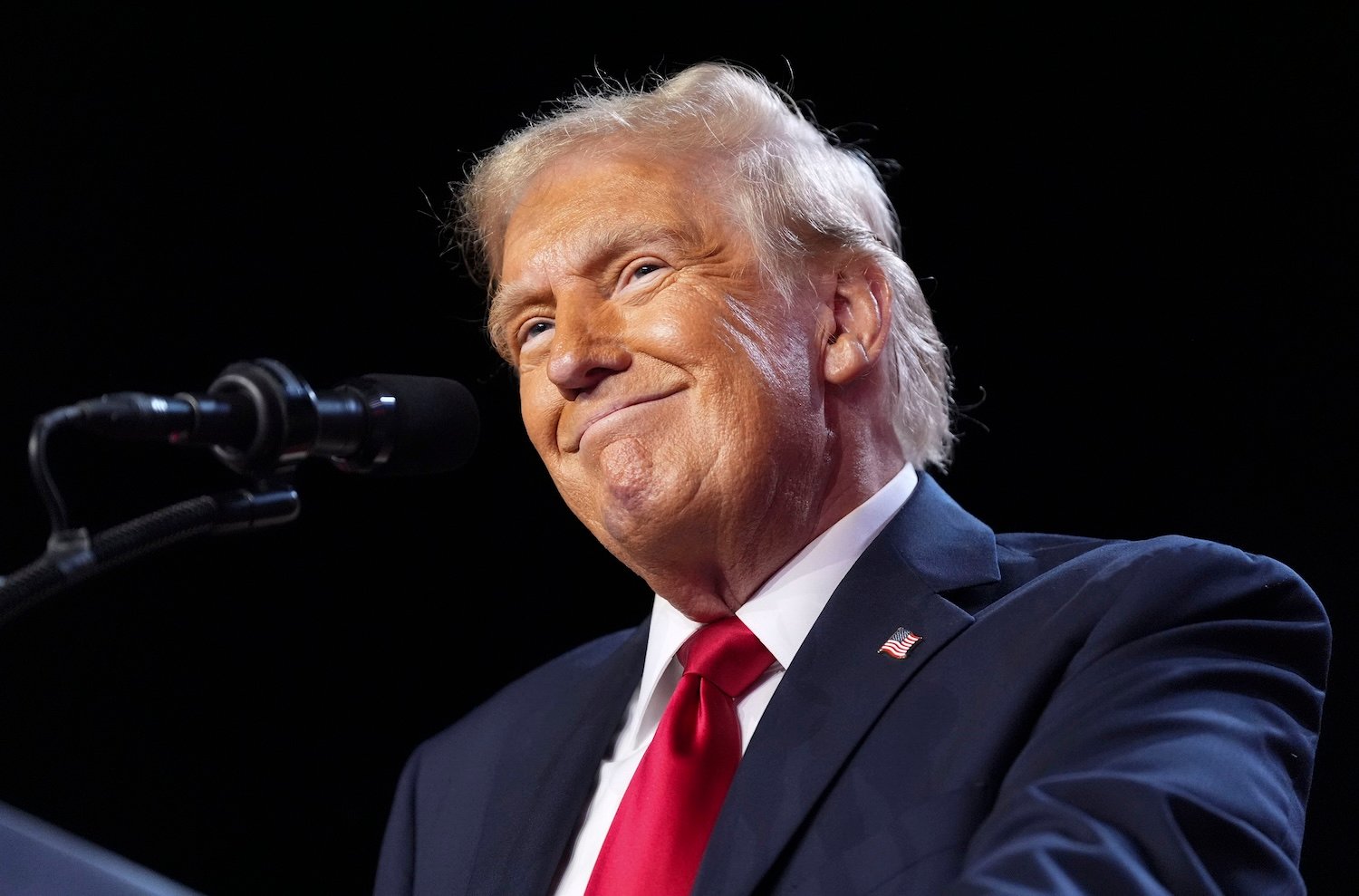 Donald Trump addresses the crowd during an election night party at the Palm Beach County Convention Center in West Palm Beach, Florida on November 6, 2024.