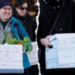 Fired USAID workers send message to Trump on boxes while leaving office for last time