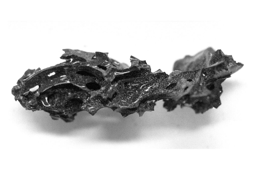 A fragment of organic glass formed from the brain of an individual in Herculaneum.