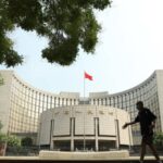 China's central bank follows U.S. Fed in keeping rates steady as tariff threats pressure yuan