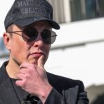 Elon Musk tells Tesla employees 'hang onto your stock' in all-hands