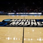 March Madness: Fan throws water bottle on court at Louisville-Creighton game