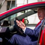 Donald Trump in a Tesla