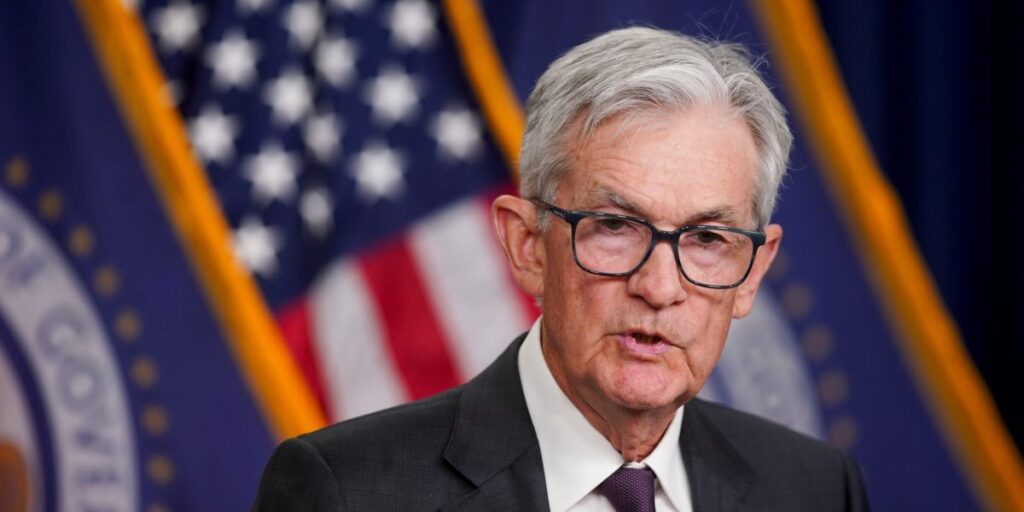 Fed keeps interest rates steady after a stock market sell-off and a brewing trade war