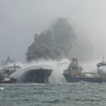 Fire and rescue services attend after a collision between oil tanker Stena Immaculate and the cargo vessel Solong