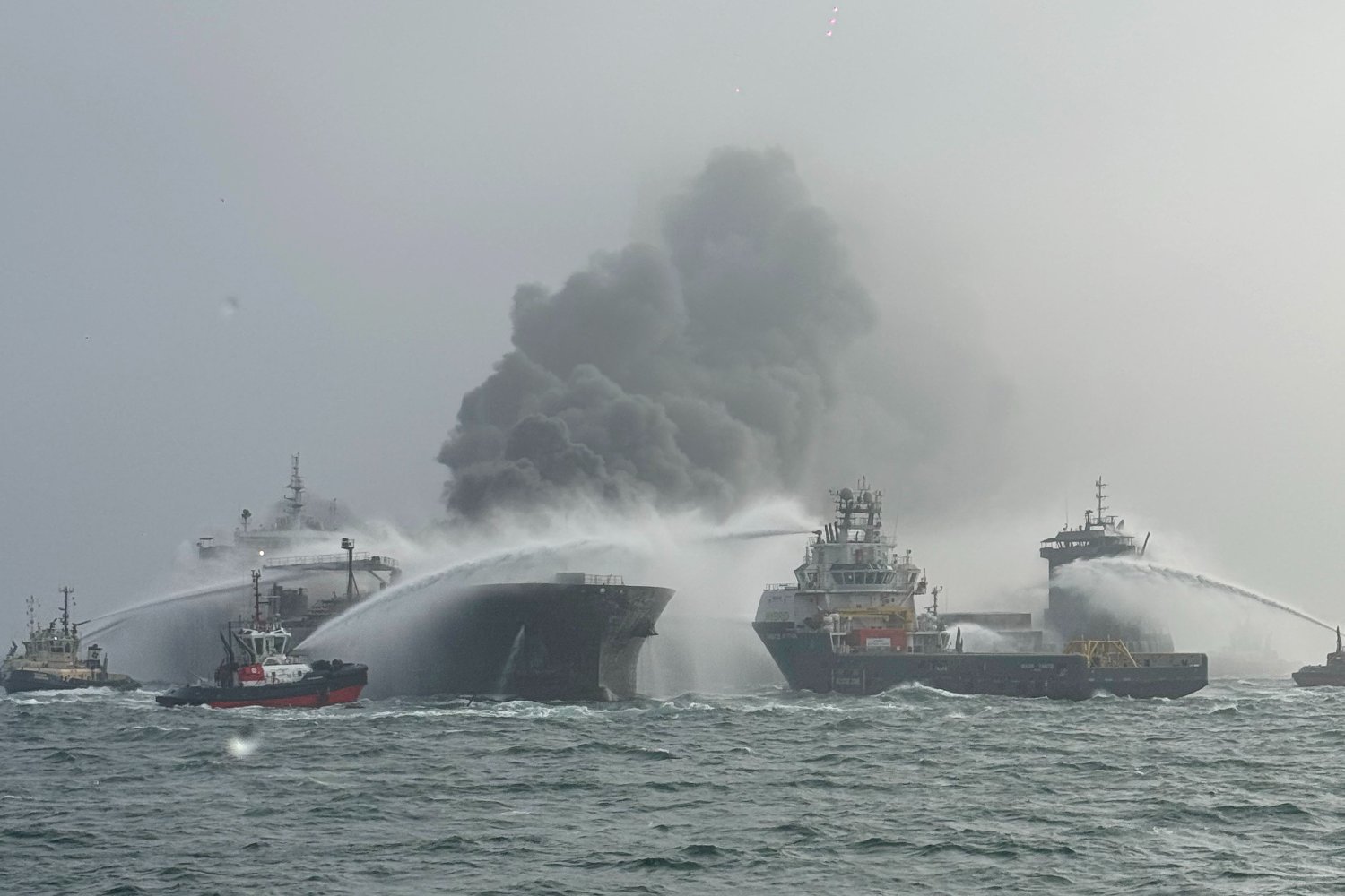 Fire and rescue services attend after a collision between oil tanker Stena Immaculate and the cargo vessel Solong