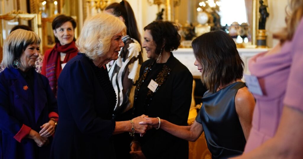 Victoria Beckham Curtsies to Queen Camilla at Glitzy Palace Reception