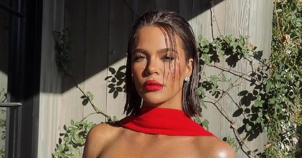 Khloe Kardashian Has Major Bombshell Moment in Ruby Red Dress