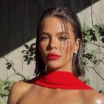 Khloe Kardashian Has Major Bombshell Moment in Ruby Red Dress