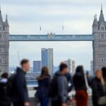 UK employers slow hiring, pay growth cools, survey shows