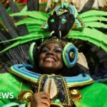 Flames, feathers and fangs feature in spectacular parade