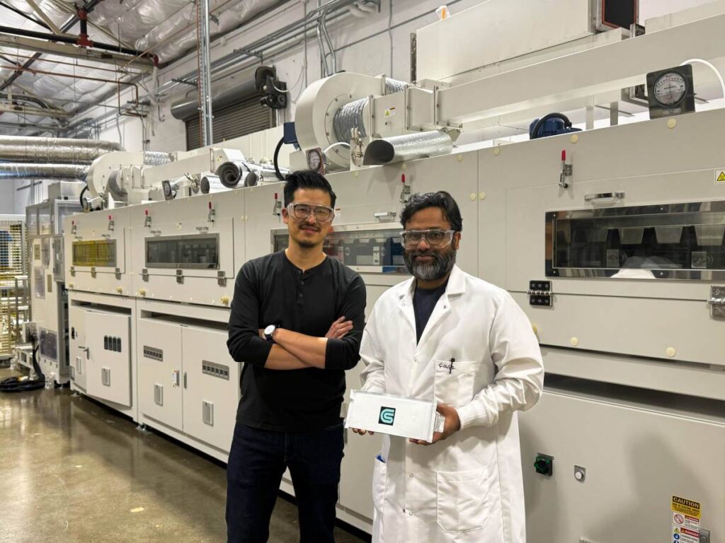 Coreshell founders Jonathan Tan and Roger Basu hold a sample battery.