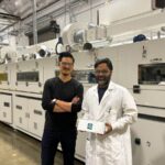 Coreshell founders Jonathan Tan and Roger Basu hold a sample battery.