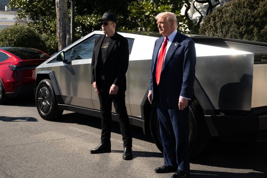 Elon Musk and Donald Trump do an ad for Tesla at the White House on March 11, 2025.