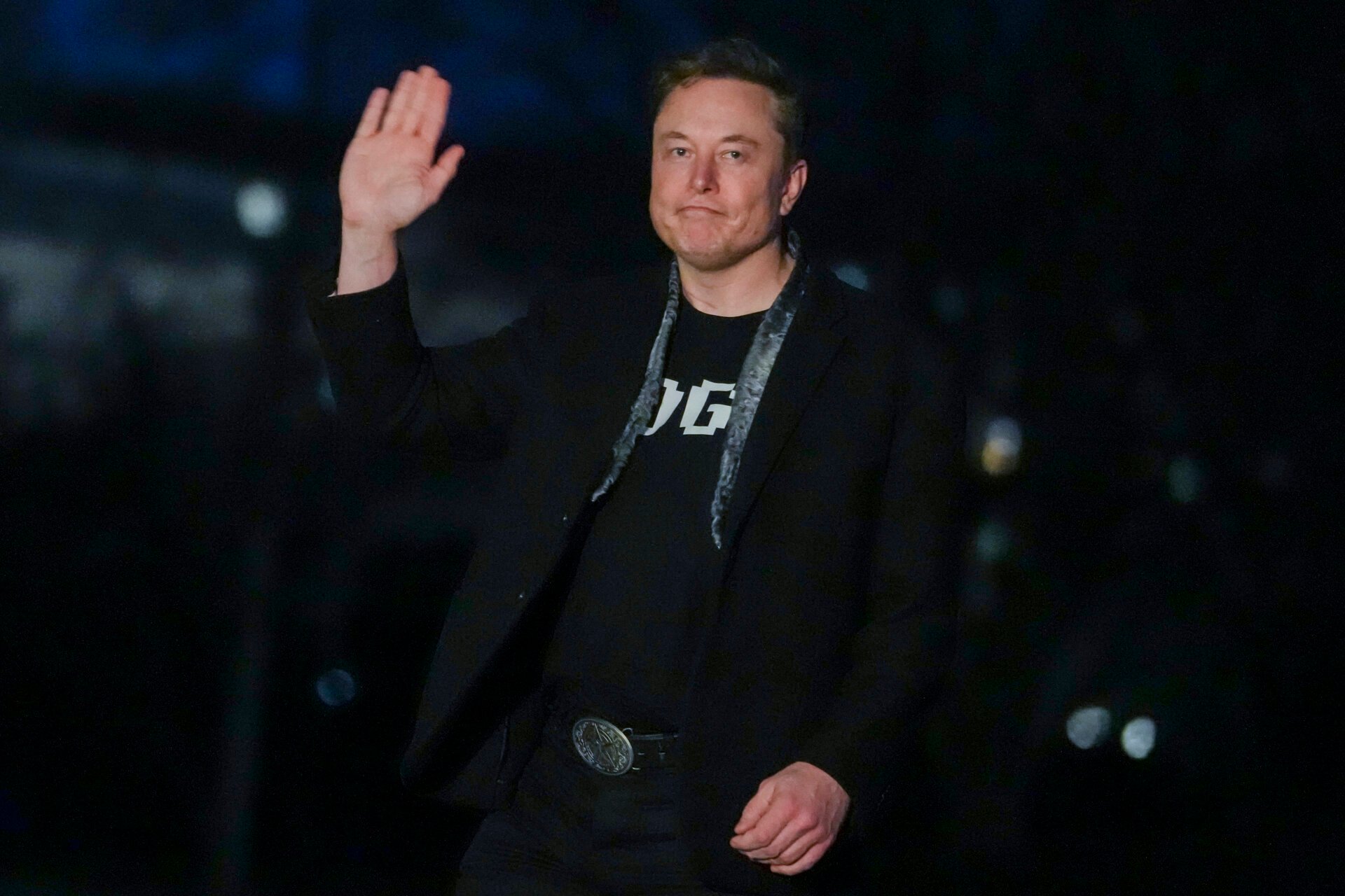 Elon Musk waves as he walks on the South Lawn of the White House after stepping off Marine One upon arrival to the White House in Washington, DC on March 9, 2025.