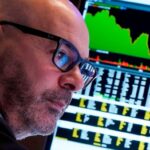 A trader works on the floor of the New York Stock Exchange