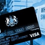 A government credit card superimposed onto a Whitehall sign