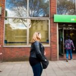 People walk past a Job Centre in Westminster