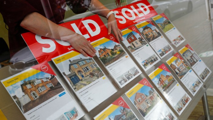 UK house prices dip in February with end to stamp duty holiday, Halifax says