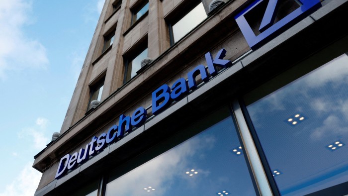 The Deutsche Bank logo is displayed prominently on the facade of a building