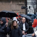 Columbia and Barnard faculty speak to media outside Columbia University in New York City on Tuesday