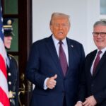 Donald Trump stands beside Keir Starmer at the White House.