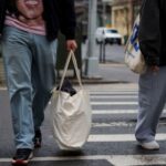 Shoppers carry bags in the Soho neighbourhood of New York