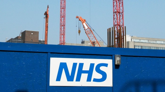 Construction hoarding surrounding the site of the new extension building of the Royal London Hospital