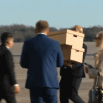 Loading boxes onto Air Force One