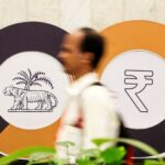 India central bank cuts rates, changes stance to "accommodative"